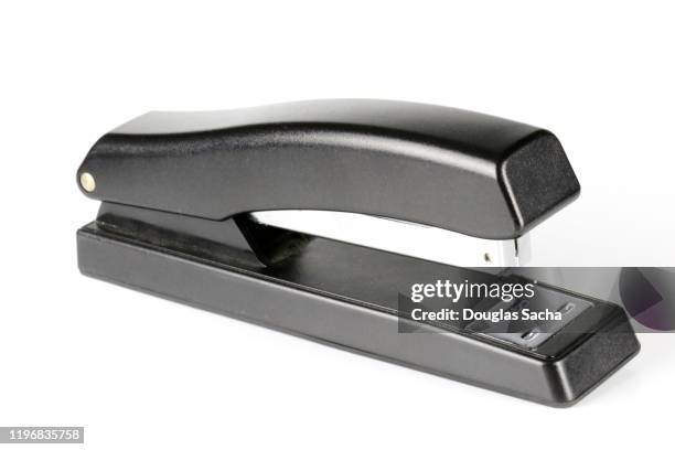 desk stapler on a white background - tacler stock-fotos und bilder