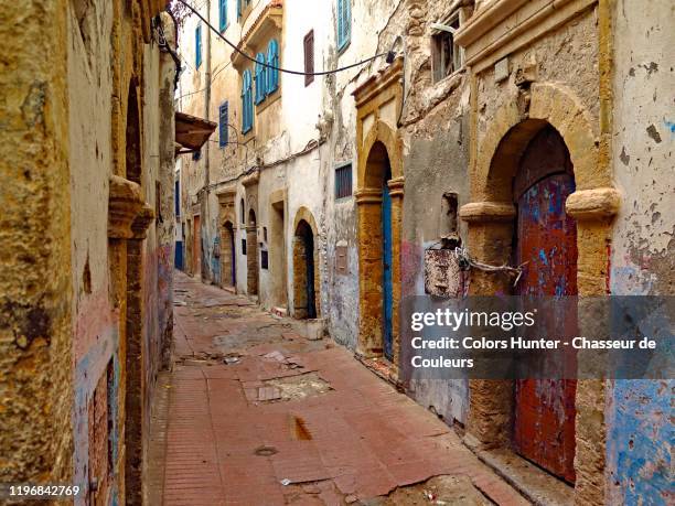 small street and old colorful houses in essaouira - medina district stock pictures, royalty-free photos & images
