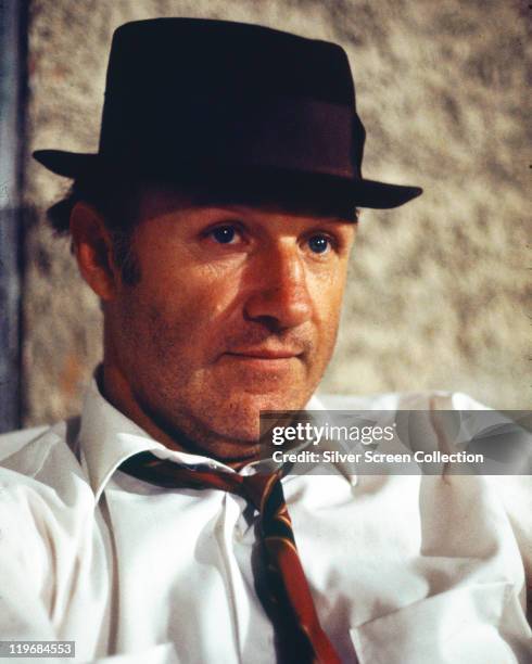 Gene Hackman, US actor, wearing a black porkpie hat in a publicity portrait issued for the film, 'The French Connection', 1971. The crime thriller,...