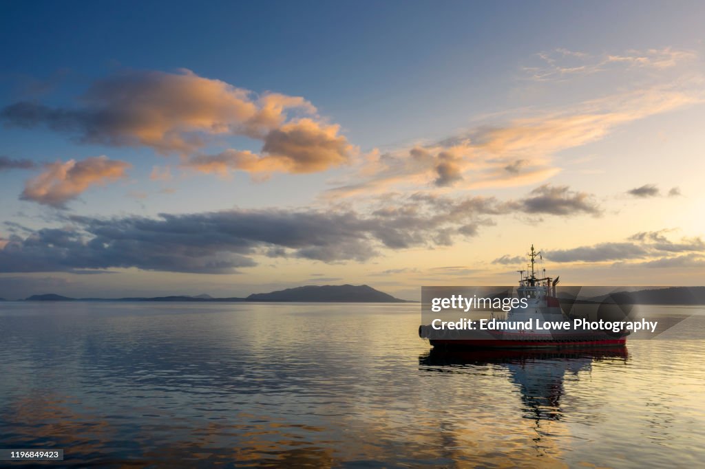 Tugboat Anchored in the San Juan Islands During a Beautiful Sunset.