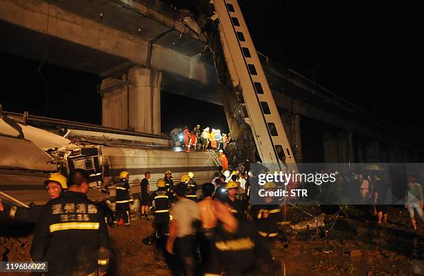 General view shows the wreckage of a high-speed train which derailed between the cities of Hangzhou and Wenzhou, in eastern China's Zhejiang province...