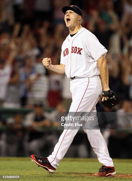 Jonathan Papelbon of the Boston Red Sox celebrates the win over the Seattle Mariners on July 23, 2011 at Fenway Park in Boston, Massachusetts. The...