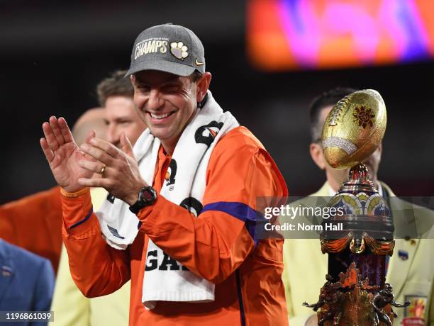 Head coach Dabo Swinney of the Clemson Tigers celebrates after a win against the Ohio State Buckeyes during the Playstation Fiesta Bowl at State Farm...