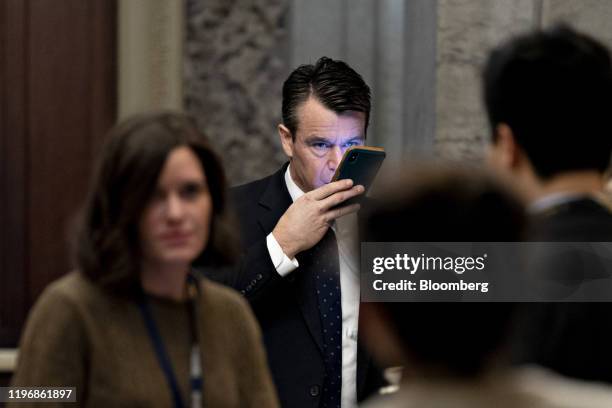 Senator Todd Young, a Republican from Indiana, center, arrives to the U.S. Capitol in Washington, D.C., U.S., on Monday, Jan. 27, 2020. An explosive...