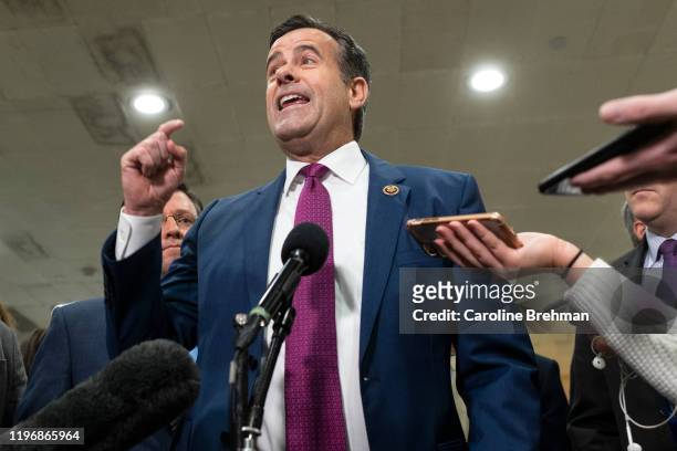 Rep. John Ratcliffe, R-Texas, speaks during a news conference during a break in the impeachment trial of President Donald Trump on Monday, Jan. 27,...