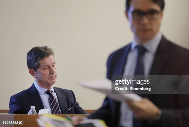 Alex Gorsky, chief executive officer of Johnson & Johnson, listens while being questioned on the stand at Middlesex County Superior Court in New...