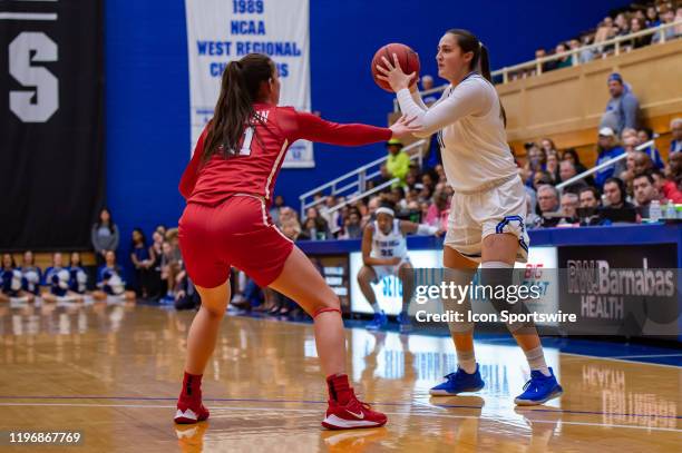 Seton Hall Pirates forward Alexia Allesch looks to pass the ball during the first half of the womens college basketball game between the St. Johns...