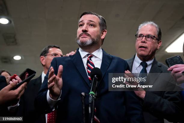 Sens. Ted Cruz and Mike Braun speak to the media during a dinner break in the Senate impeachment trial at the U.S. Capitol January 27, 2020 in...