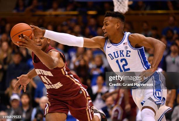 Steffon Mitchell of the Boston College Eagles battles Javin DeLaurier of the Duke Blue Devils for a loose ball during the first half of a game at...