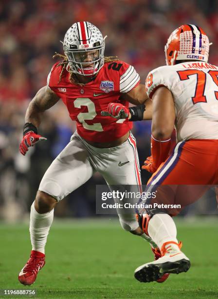 Defensive end Chase Young of the Ohio State Buckeyes in action during the PlayStation Fiesta Bowl against the Clemson Tigers at State Farm Stadium on...