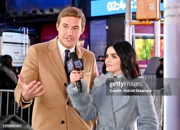 Peter Weber of The Bachelor and Lucy Hall attend Dick Clark's New Year's Rockin' Eve With Ryan Seacrest 2020 on December 31, 2019 in New York City.