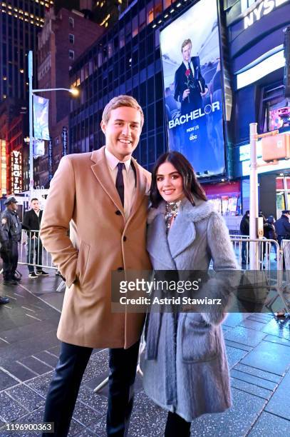 Peter Weber of The Bachelor and Lucy Hall attend Dick Clark's New Year's Rockin' Eve With Ryan Seacrest 2020 on December 31, 2019 in New York City.