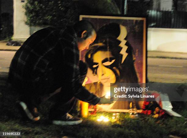 Amy Winehouse vigil outside Amy Winehouse's North London home on July 23, 2011 in London, England. Singer Winehouse was found dead today.