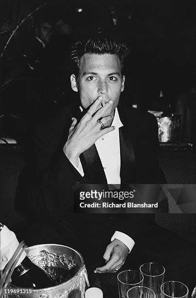American actor Johnny Depp attends a party for the film 'Ed Wood', in which he plays the lead, at the Cannes Film Festival, France, May 1995.