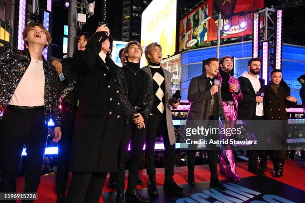 Ryan Seacrest, Post Malone and Sam Hunt attend Dick Clark's New Year's Rockin' Eve With Ryan Seacrest 2020 on December 31, 2019 in New York City.