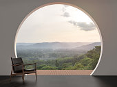 A wall with arch shape gap looking out over the mountains 3d render