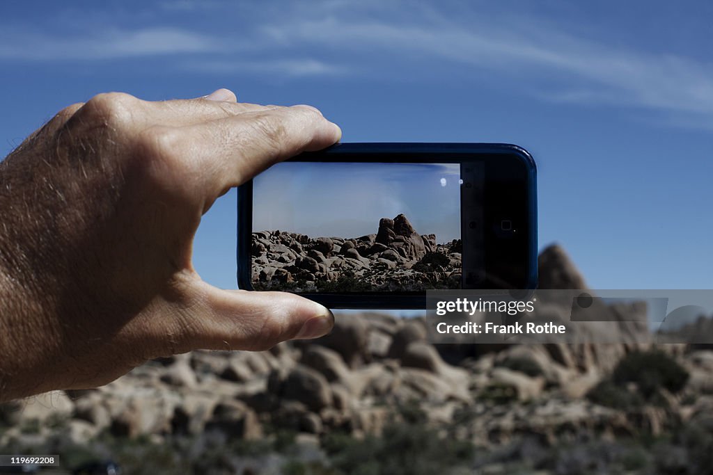 Taking a picture in with a smart phone in the wild