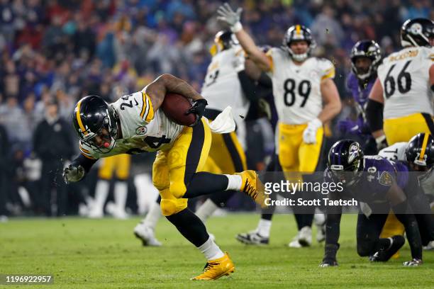 Benny Snell of the Pittsburgh Steelers carries the ball against the Baltimore Ravens during the first half at M&T Bank Stadium on December 29, 2019...