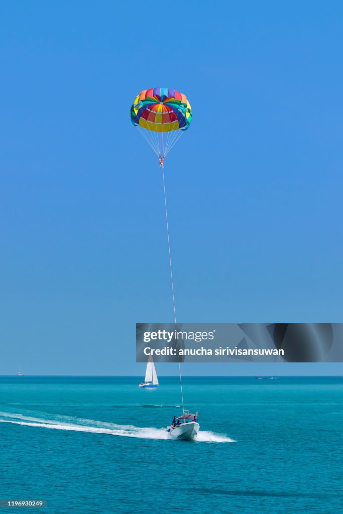 Parasailing in Phuket sea at thailand.