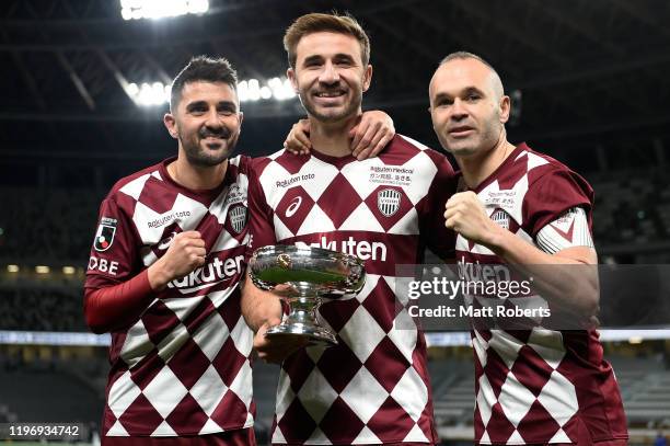 David Villa, Sergi Samper and Andres Iniesta pose with the Emperor's Cup after the 99th Emperor's Cup final between Vissel Kobe and Kashima Antlers...