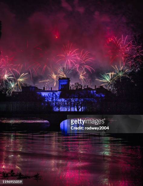 fireworks fill the sky as 2020 begins in london - new years eve 2019 stock pictures, royalty-free photos & images