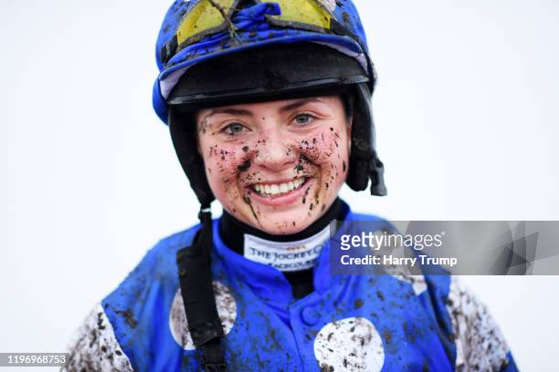 Muddy Jockey Bryony Frost poses after racing in the Racing TV Extra Novices’ Hurdle at Exeter Racecourse on January 01, 2020 in Exeter, England.