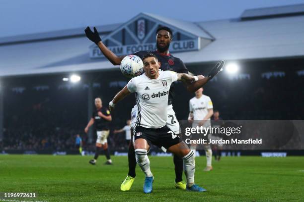 Anthony Knockaert of Fulham tackles with Tyler Blackett of Reading during the Sky Bet Championship match between Fulham and Reading at Craven Cottage...