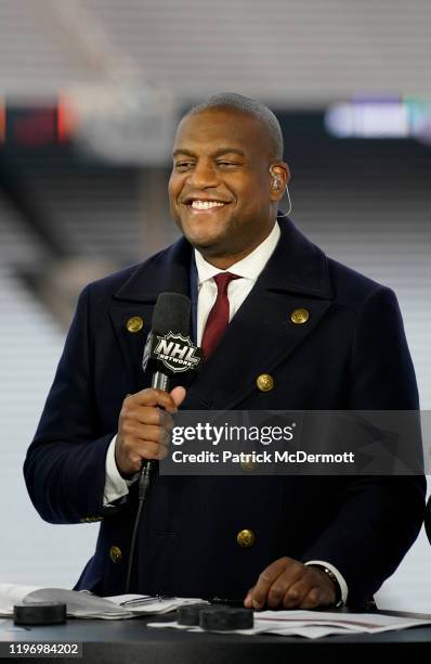 Network sportscaster Kevin Weekes speaks on-air during the 2020 NHL Winter Classic between the Nashville Predators and the Dallas Stars at Cotton...