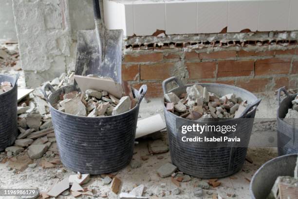 damaged bricks in baskets - escombros material imagens e fotografias de stock