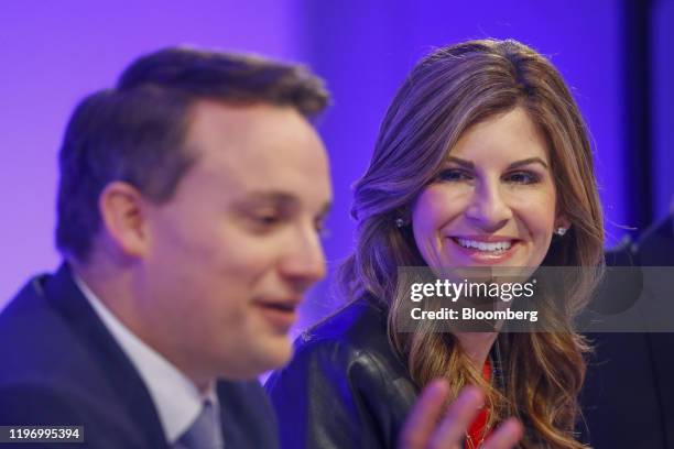 Jennifer Morgan, co-chief executive officer of SAP SE, right, reacts beside Christian Klein, co-chief executive officer of SAP SE, during the...