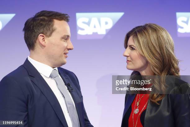 Christian Klein, co-chief executive officer of SAP SE, left, and Jennifer Morgan, co-chief executive officer of SAP SE, speak following the company's...