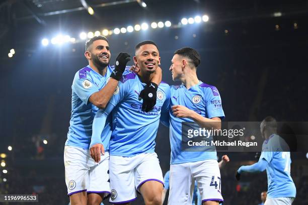 Gabriel Jesus of Manchester City celebrates with his team after he scores his sides first goal during the Premier League match between Manchester...