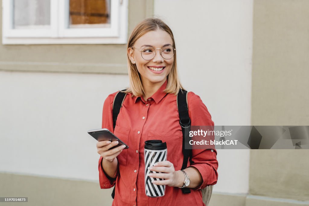 Modern young woman on the street