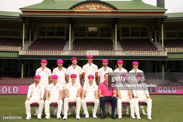 The Australian Mens Test Cricket team and Glenn McGrath pose for a photograph wearing the 'Baggy Pink' in support of the McGrath Foundation during an...