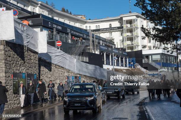 Limousines and cars are queuing up in a main Davos street during the 50th World Economic Forum .