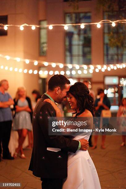 bride and groom dancing at reception - first night of marriage stock pictures, royalty-free photos & images
