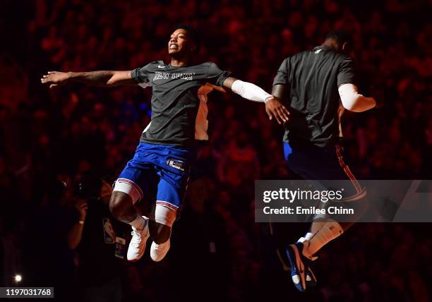 Elfrid Payton and Julius Randle of the New York Knicks jump to high five prior to their game against the Portland Trail Blazers at Madison Square...