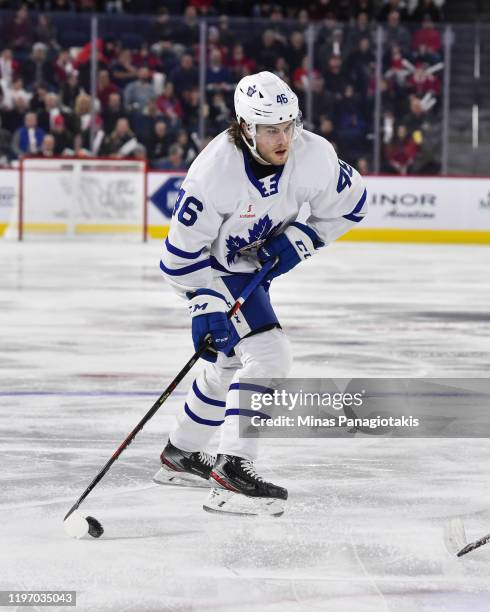 Pontus Aberg of the Toronto Marlies skates the puck against the Laval Rocket during the first period at Place Bell on December 28, 2019 in Laval,...