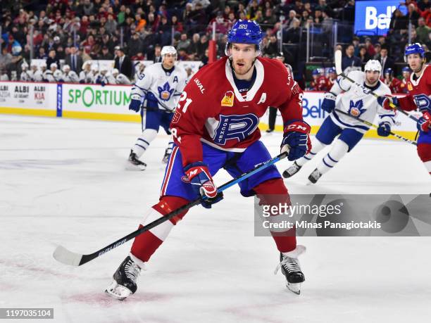 Dale Weise of the Laval Rocket skates against the Toronto Marlies during the third period at Place Bell on December 28, 2019 in Laval, Canada. The...