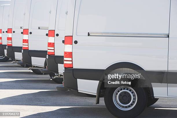 usa, florida, miami, white trucks parked side by side - stationery close up stock pictures, royalty-free photos & images