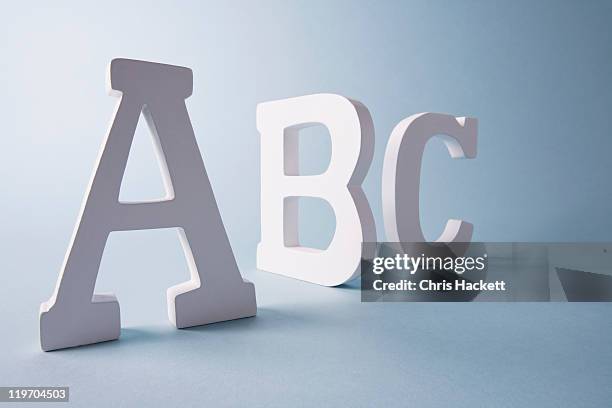 studio shot of a,b,c letters - alphabetical order stock pictures, royalty-free photos & images