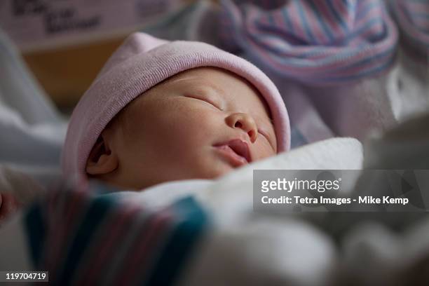 usa, utah, salt lake city, portrait of newborn girl (0-1months) - 0 1 months stock pictures, royalty-free photos & images