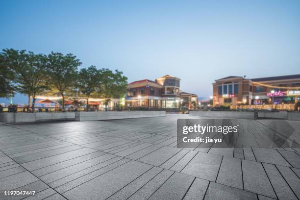 night view of citizen square in jinji lake tourist area, suzhou - concrete footpath stock pictures, royalty-free photos & images