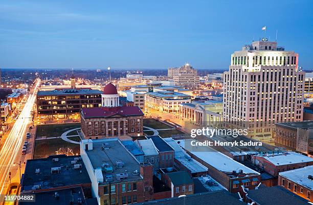 usa, illinois, springfield, city illuminated at dusk - illinois capitol stock pictures, royalty-free photos & images