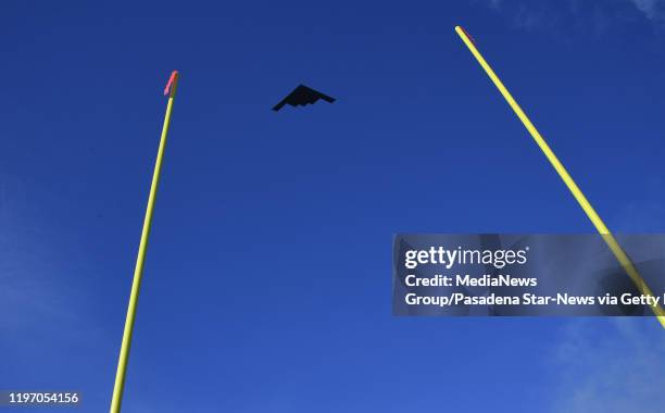 Stealth bomber flyover prior to the 106th Rose Bowl game between the Oregon Ducks and the Wisconsin Badgers on Wednesday, January 1, 2020 in...
