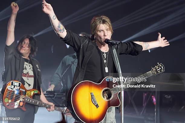 Goo Goo Dolls guitarist Robby Takac and lead singer John Rzeznik performs at the Tropicana Casino on July 23, 2011 in Atlantic City, New Jersey.