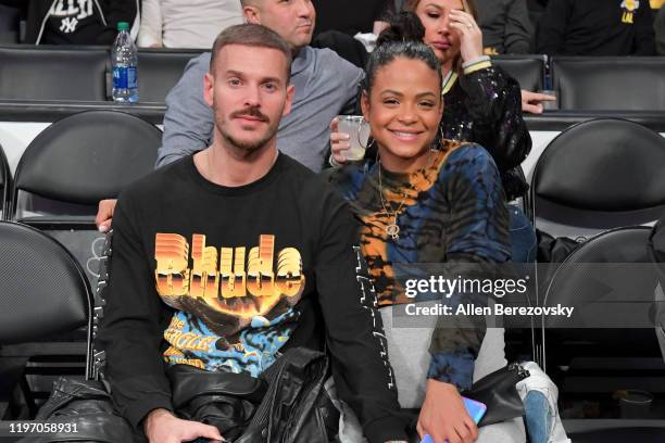 French singer Matt Pokora and Christina Milian attend a basketball game between the Los Angeles Lakers and the Phoenix Suns at Staples Center on...