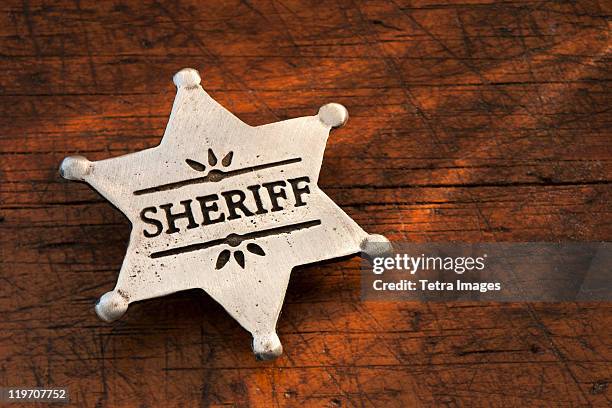 close-up of sheriff badge - police badge stock pictures, royalty-free photos & images