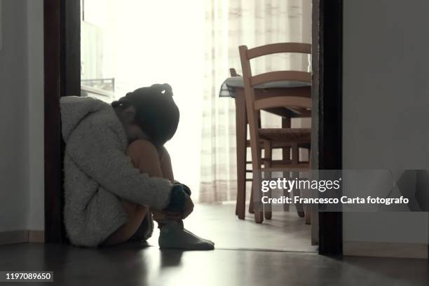 depressed  little girls - abuse stockfoto's en -beelden