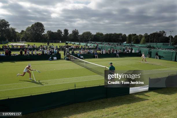 Yanina Wickmayer of Belgium volleys during her victory over Tereza Smitkova of the Czech Republic on Court 14 in the second round of women's singles...